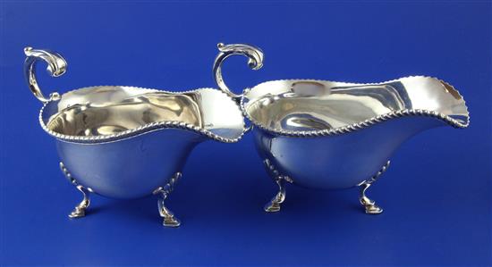 A pair of 1930s silver sauceboats, 16.5 oz.